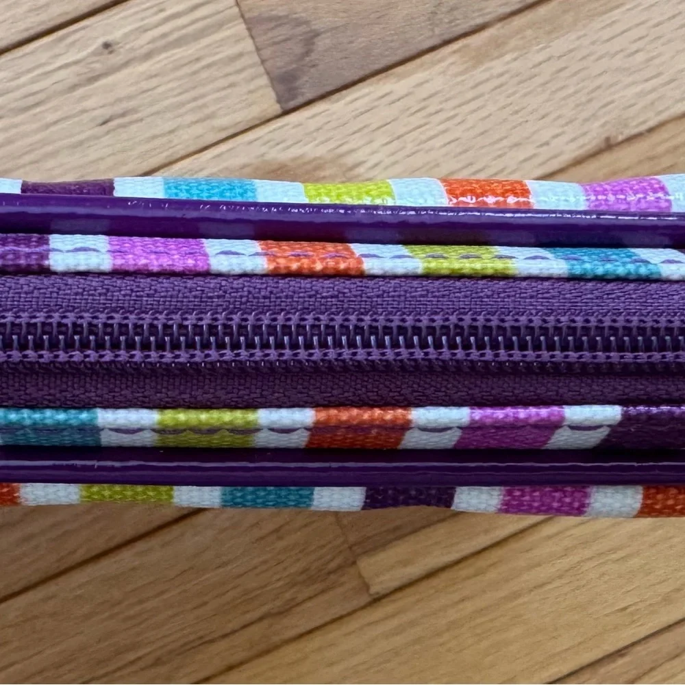 Striped Padded Laptop Sleeve - Multicolor with orange padded lining.